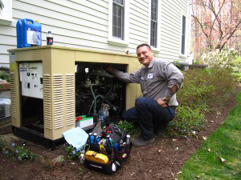 a technician fixing generator